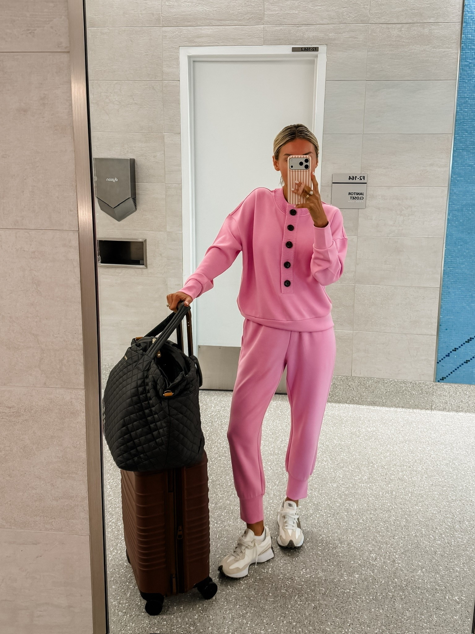 My travel outfit I wore in nyc! This shade of pink is so fun if you enjoy a brighter color to wear in fall! So cozy yet fun and put together. Wearing S in both pieces 

 Loverly Grey, Varley, loungewear, lounge set, travel outfit, airport outfit, Beis luggage, airport outfit ideas, pink matching set

#LTKTravel #LTKootd