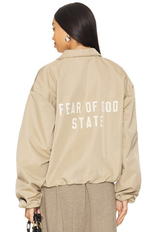 Fear of God ESSENTIALS Track Jacket in Desert Sand from Revolve.com | Revolve Clothing (Global)