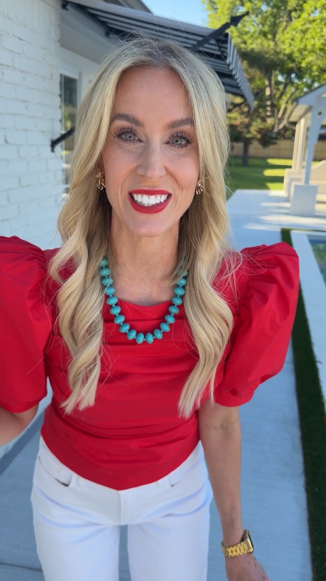 Obsessed with this puff sleeve red blouse!! Runs small. Consider sizing up. Wearing @Avara jeans, jewelry, and bag too!