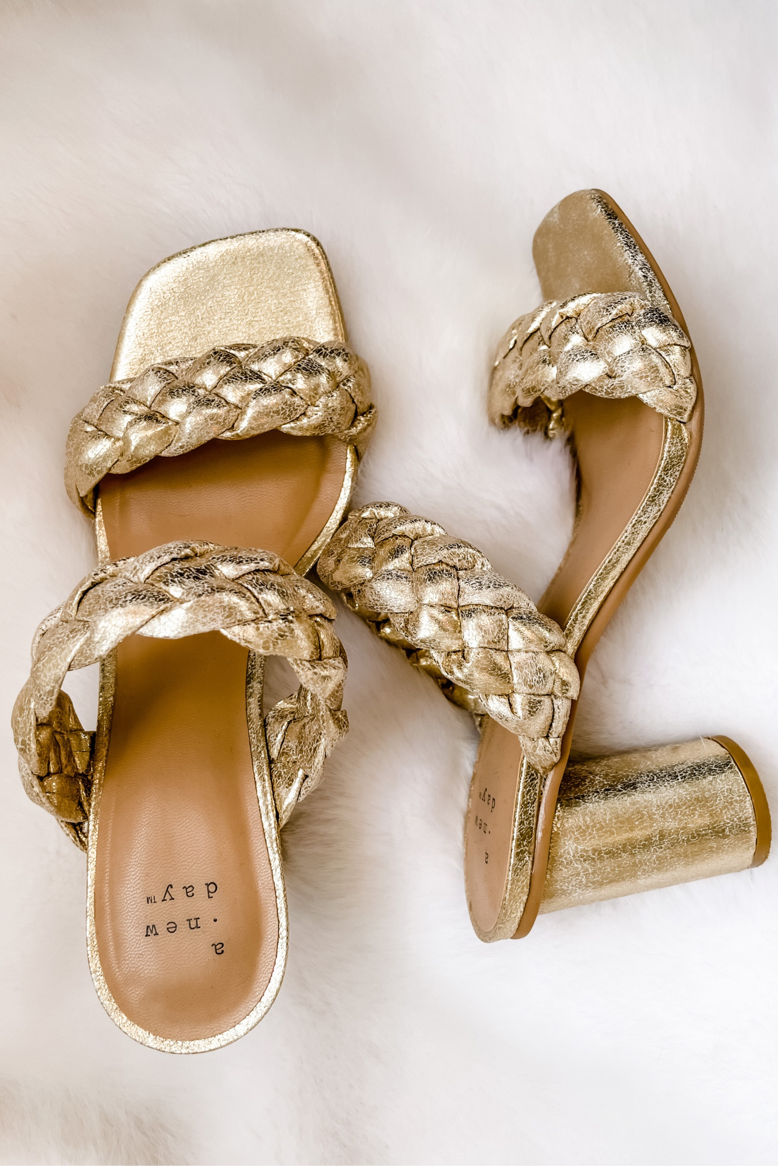 Great shoe for dancing at a wedding! 

#goldheels 
#target #braided #goldpumps 

#LTKwedding #LTKworkwear #LTKshoecrush