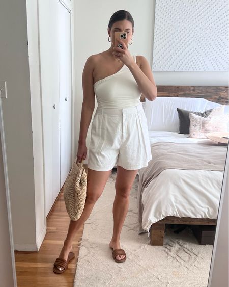 One shoulder bodysuit from Amazon with white linen shorts from Abercrombie. Spring outfit 

#springoutfit #linenshorts #amazonbodysuit #linentailoredshorts 

#LTKFind #LTKstyletip #LTKU