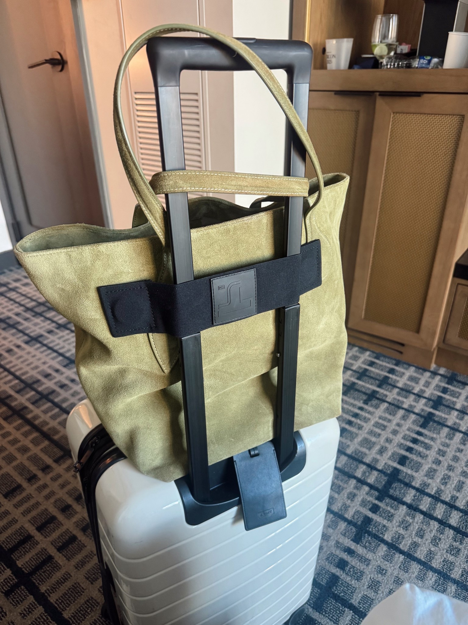 This handy strap turns any tote bag into a travel bag! 

#LTKCon #LTKTravel #LTKStyleTip