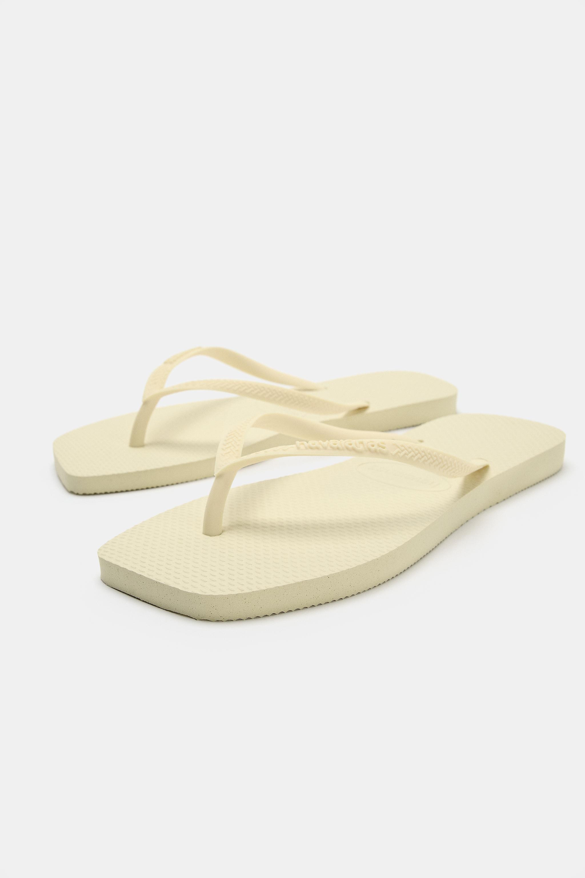 Flat sandals. Front strap with toe divider. Embossed sole. Square toe. Sole height: 1.5 cm. / 0.5... | Zara UK