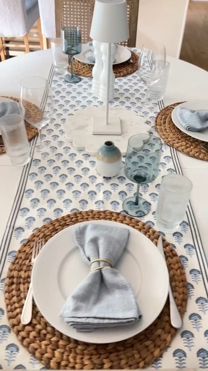 Coastal tablescape ideas including a block print runner, blue and white decor, seagrass chargers, white dishware, blue wine glasses, linen napkins, gold napkin rings, LED touch lamp and scalloped marble board
12/10

#LTKHome #LTKStyleTip #LTKParties
