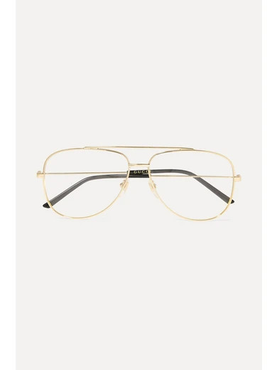 Gucci
				
			
			
			
			
			
				Aviator-style gold-tone and acetate optical glasses
				$435 | NET-A-PORTER (US)