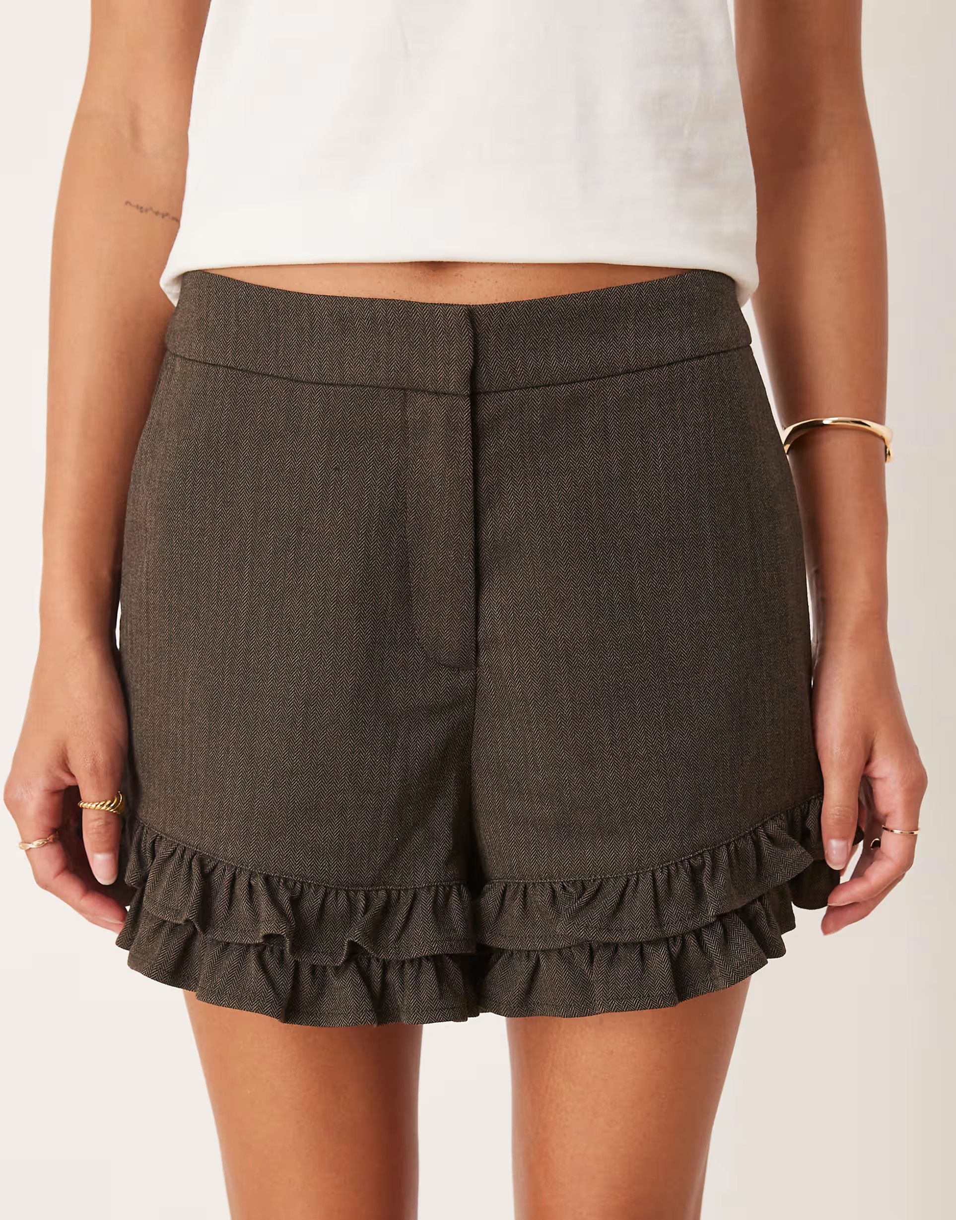 ASOS DESIGN tailored ruffle hem shorts in brown herringbone | ASOS (Global)
