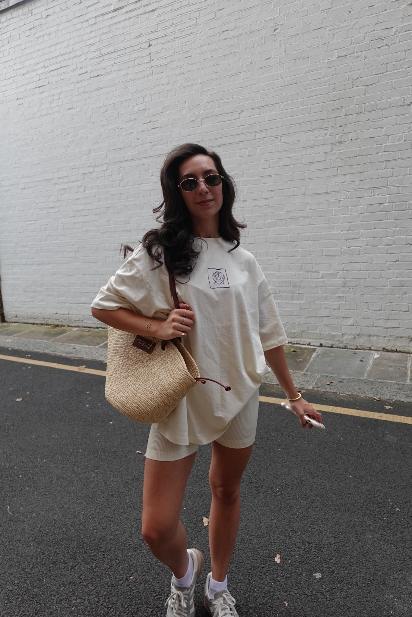 Graphic printed tshirt, asos, cycling shorts, high street style, Sezane bag, adidas spezial trainers, asos sunglasses, summer outfit 

#LTKsummer #LTKstyletip #LTKuk