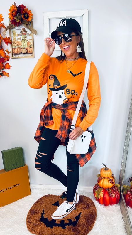 Discount Codes:
Hoodie, BOO long sleeve tee, Pumpkin rug, & Pumpkin purse: LINZ25 for 25% off EVALESS

Sunglasses: SJLINZ30A for 10% off SOJOS glasses (enter at checkout on Amazon)

Shirt: Small
Hoodie (video intro): Medium
Leggings: Small (linked similar, mine are sold out)
Flannel: Small

Halloween outfit, Halloween costume, fall outfits, slashed black leggings 

#LTKstyletip #LTKSeasonal #LTKHalloween