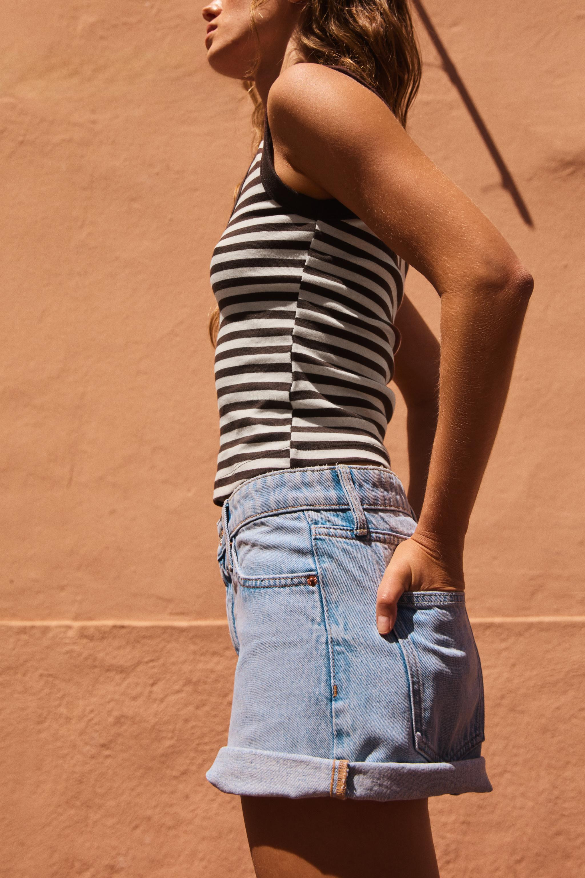SLIM FIT - V-NECK - REGULAR LENGTH - SLEEVELESSTank top made from 100% cotton yarn. V-neck and sl... | Zara US