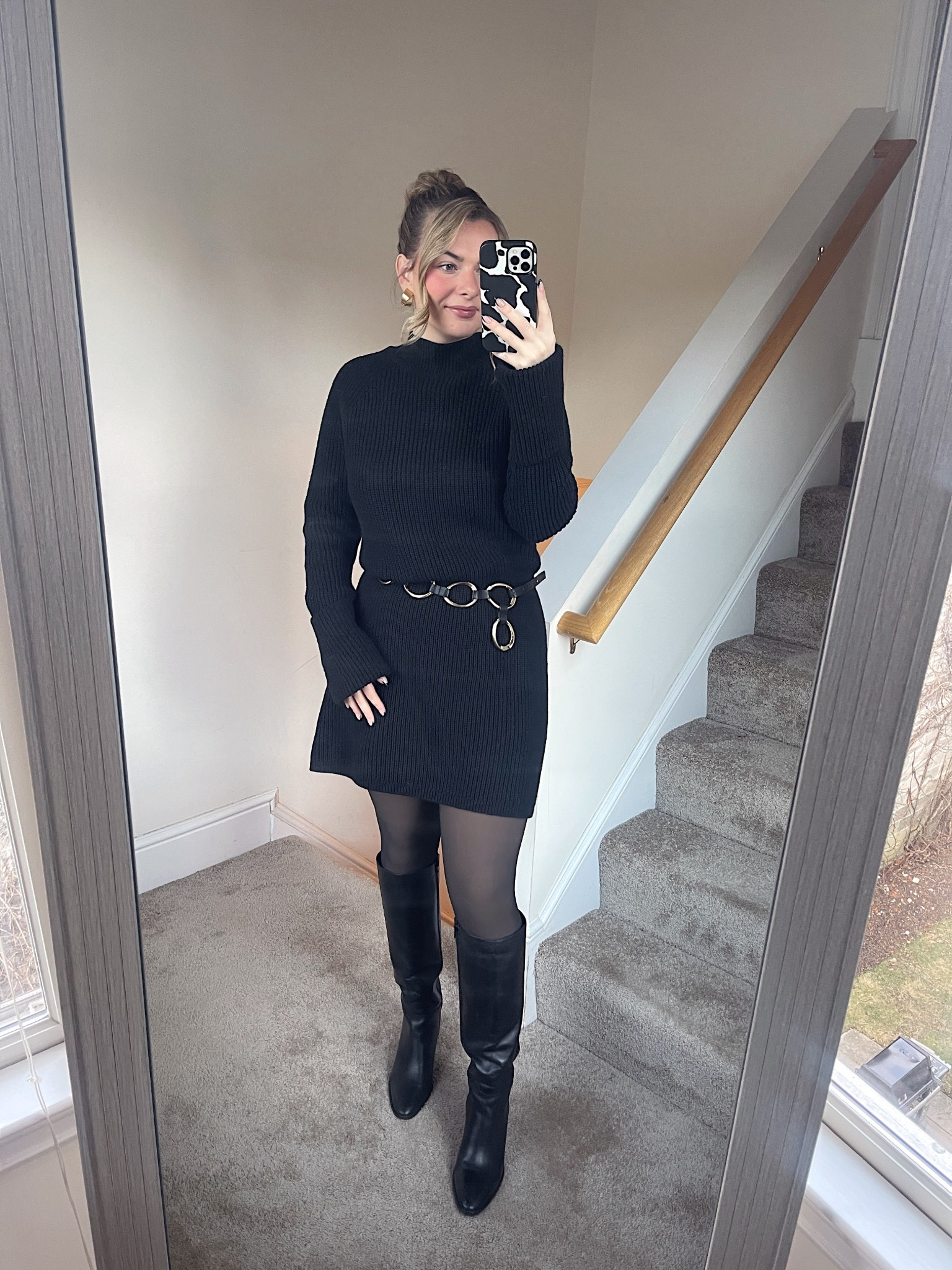Black sweater dress, black fleece lined tights and black knee high boots 

#LTKWorkwear #LTKootd #LTKgrwm