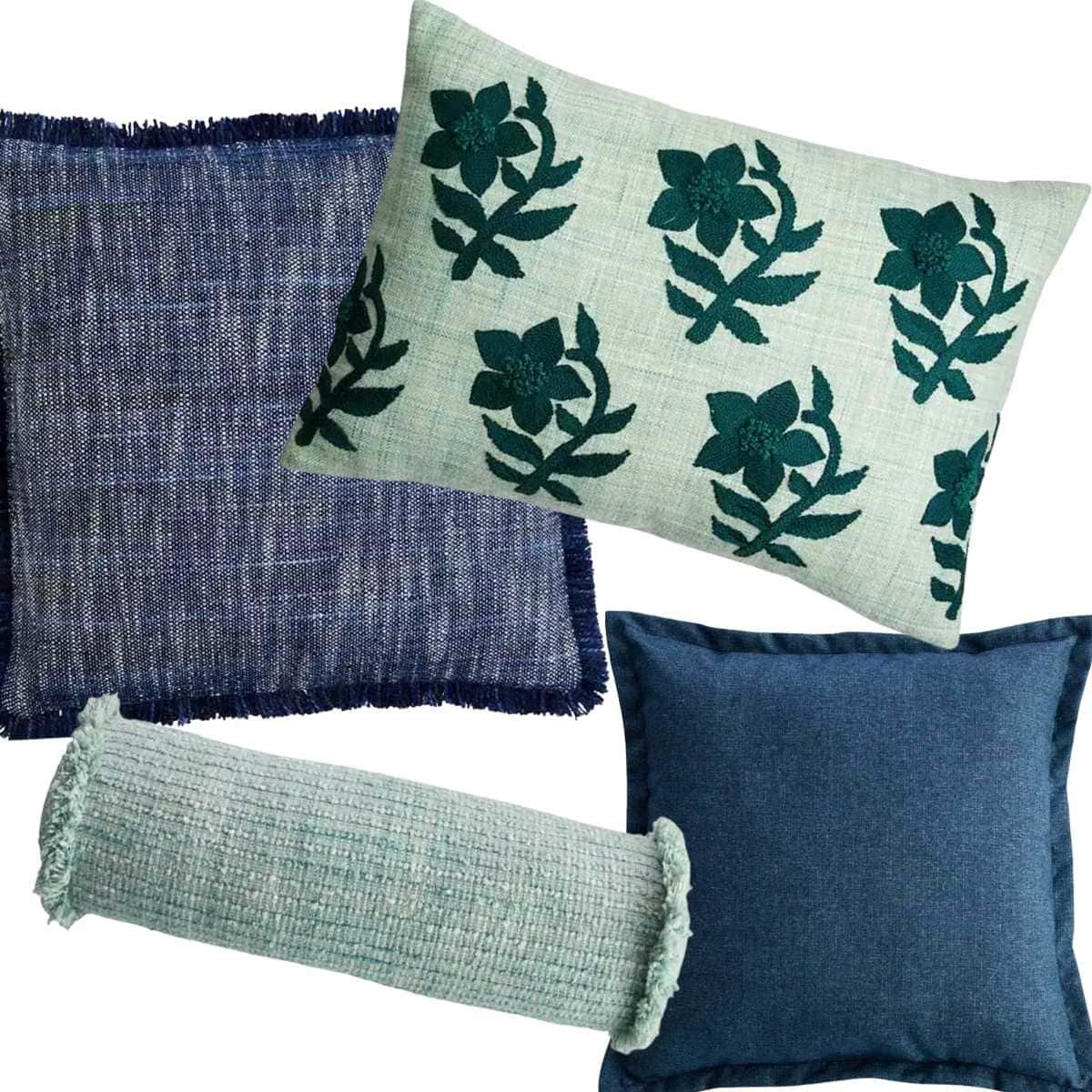These blue and green outdoor pillows were the easiest way we added color to our screened-in porch. They are fade-resistant and are a great addition to your outdoor space decorating. #outdoordecor
#patiodecor
#porchdecor
#outdoorliving  

 #LTKHome