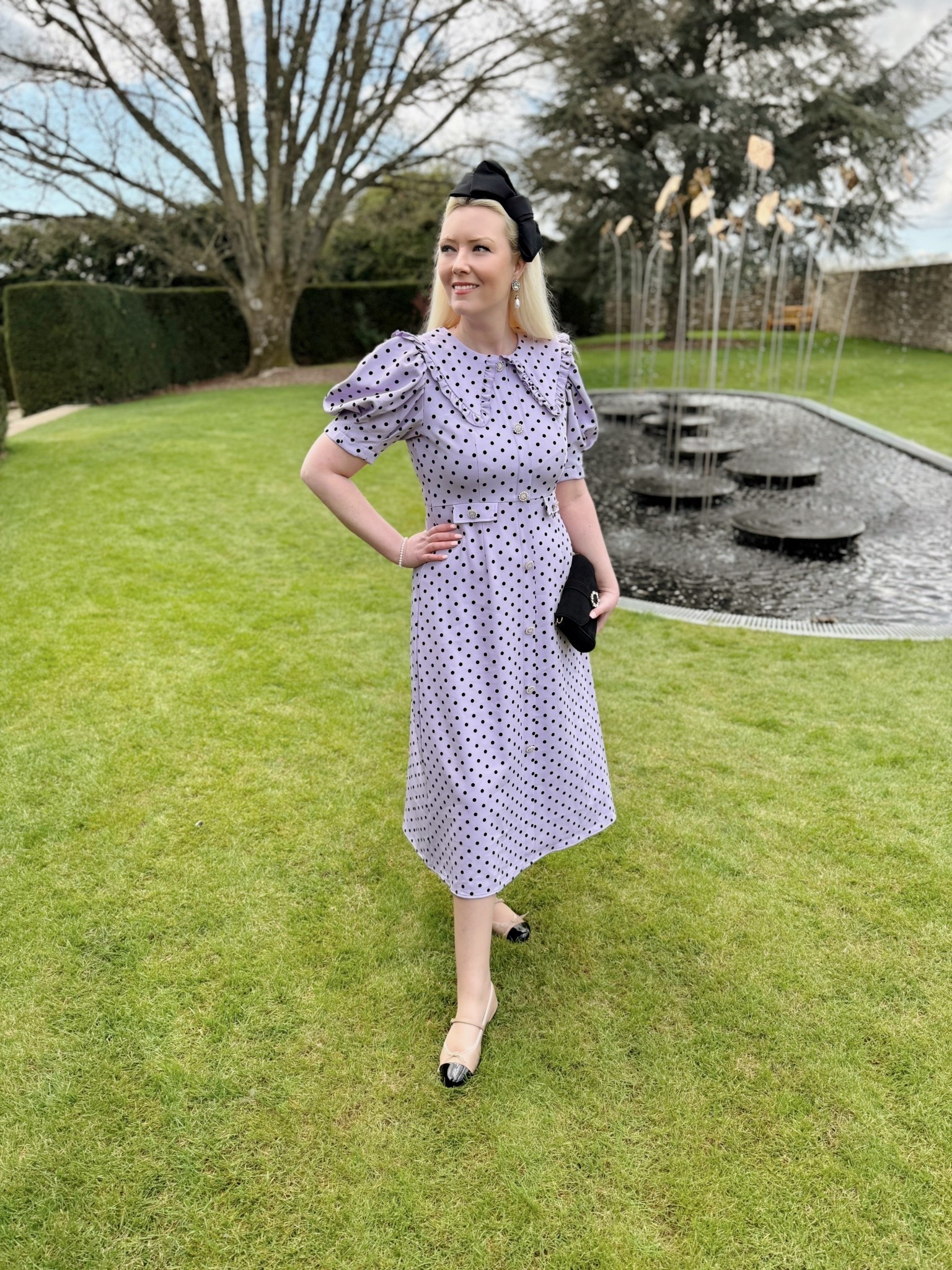 Trending Tuesday with polka dots ✔️ a sailor collar ✔️ and a pretty spring shade of lilac ✔️ see product list for lilac dress heaven!! 💜🖤💜

Lilac Polka Dot Dress - Sister Jane
Black Suede Strictly Bag - Russell and Bromley 
Ballerina Two Tone Mary Jane Shoes - Pretty Ballerinas 
Black Statement Bow Headband - Phase Eight 
Bracelet - Dower and Hall

#LTKdresses #LTKspring #LTKeurope