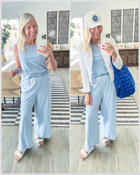 Love, this light, blue wide leg, pant, and tank top set with a white denim jacket, white Birkenstocks, and a blue tote bag. Size small in the set and jacket. Baseball soccer sports mom outfits 


#LTKstyletip #LTKover40 #LTKSeasonal