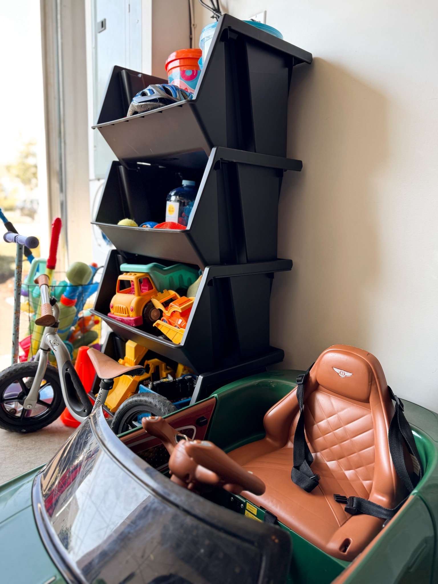 these $15 storage bins completely transformed this space in my garage! From toys and sports gear in a messy pile of crazy to organized and tidy! 😍⚽️

#LTKHome #LTKKids #LTKFamily