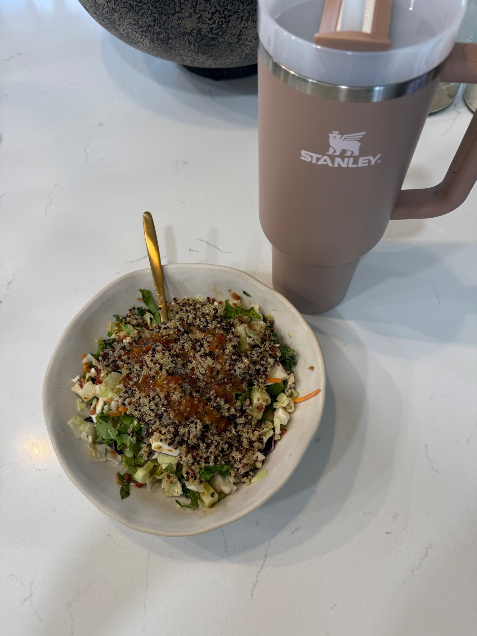Quinoa, cabbage mix, feta cheese, cucumber, bacon bits, fresh mint, and sun dried tomato vinaigrette and 32 ounces of water!!!

All less than 300 calories 👊

#LTKvlog #LTKfitnessgoals #LTKfoodie