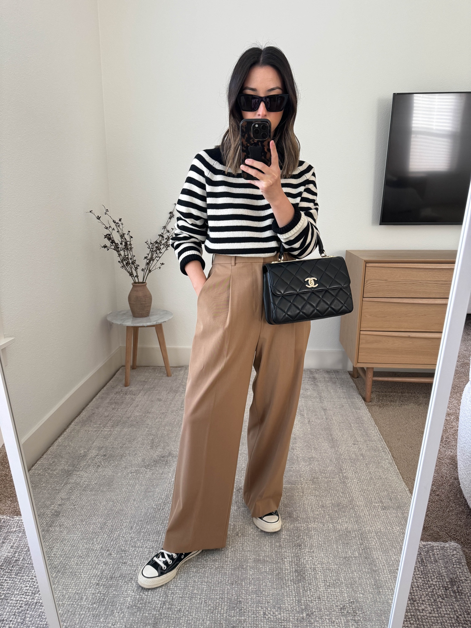 2023 Fall Capsule Wardrobe outfits. 

Everlane sweater xs
Uniqlo pants small. Runs tts. 
Converse sneakers 5
YSL sunglasses 
Chanel trendy cc small 

#LTKSeasonal #LTKstyletip #LTKshoecrush