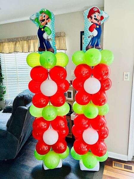 Piranha Plant Balloon tower - you could even add white sticker dots to the red balloons for more of a realistic look!

#LTKhome #LTKfamily #LTKkids