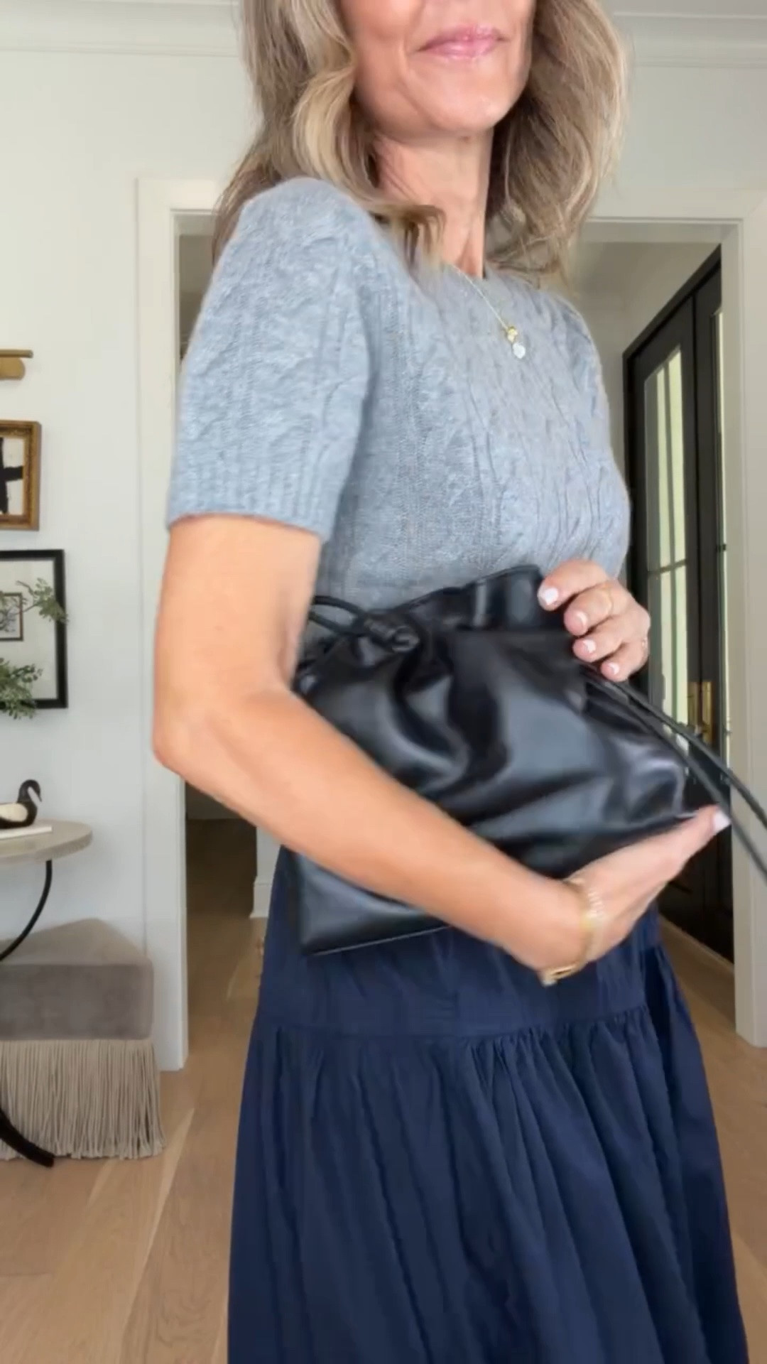 I’m 5’6’’ styling this cotton navy skirt for you several ways! Such a great versatile piece to 
bring with you into the fall.
-Navy cotton skirt size XS
-White Oxford button down size XS
-Square neck linen top size S
-Navy sweater vest size XS
-White cable knit cotton sweater size S
-Gray cashmere cable knit sweater size S
-White short sleeved tee size XS
-Brown cashmere off the shoulder top size S
@Quince  #QuincePartner