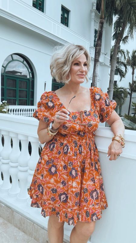 Throwing it back to Puerto Rico in this beautiful orange dress. Perfect resort wear. Currently ONSALE  #ltktravel #traveldress #vacation #vacation dress 