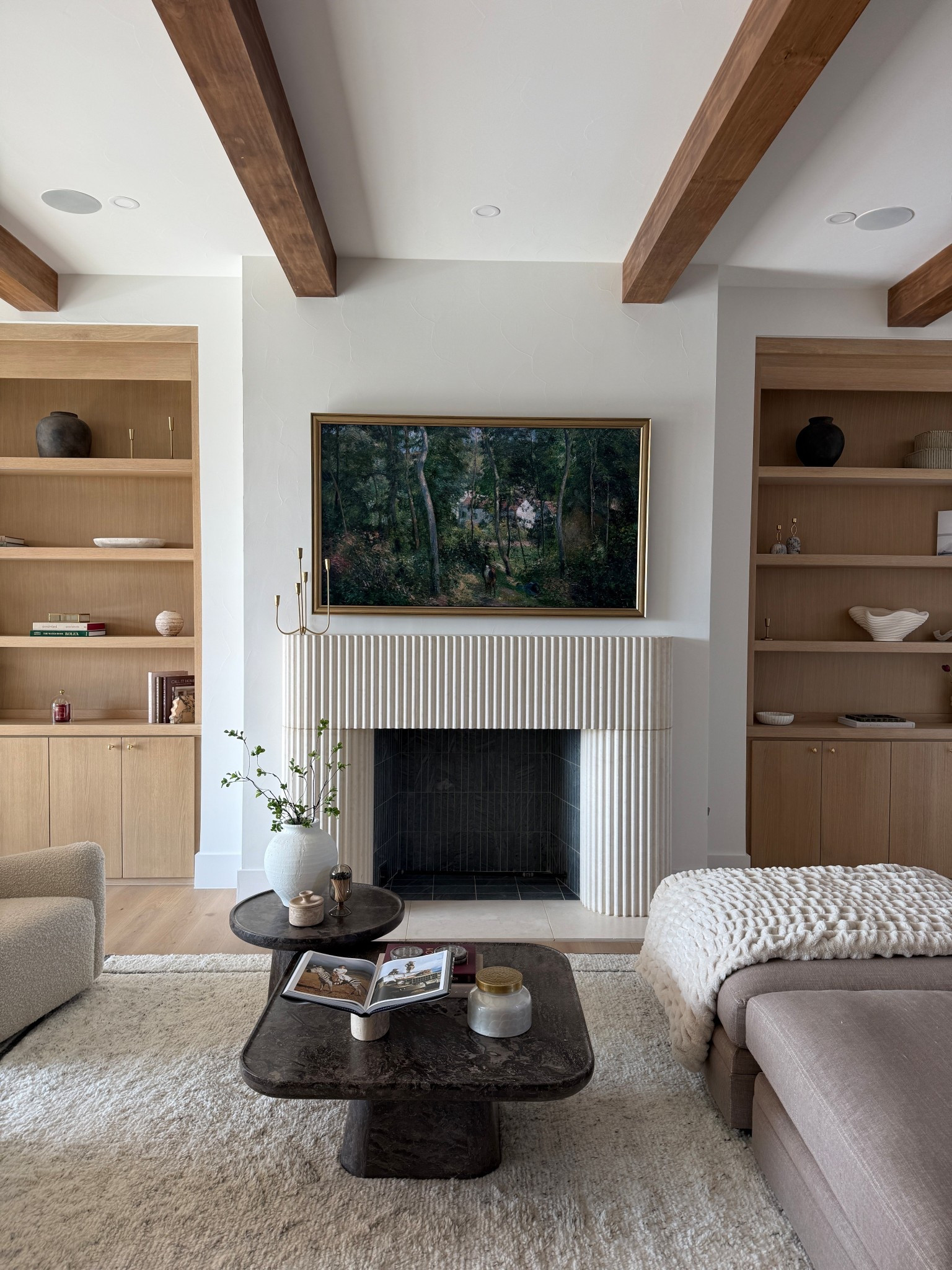 Living room details: 75in frame TV with the deco frame industrial brass color: brass, coffee tables, rug, shelf decor, & more! My favorite 3 amazon vases/ pots I’ve got! 