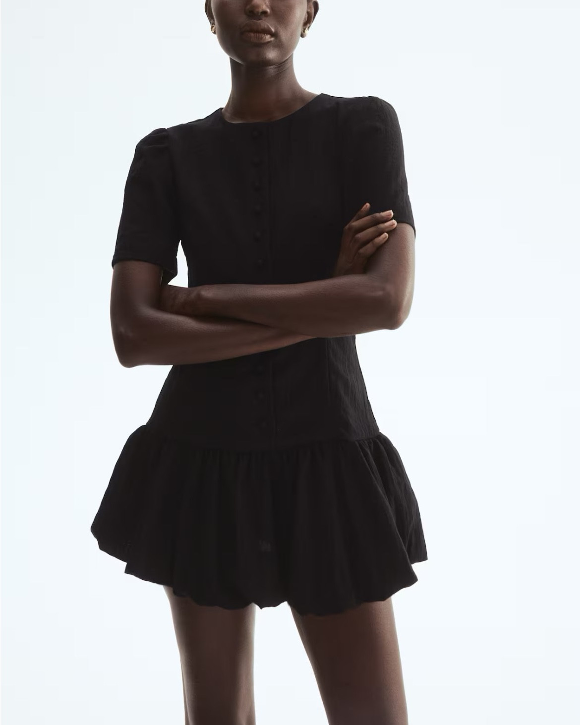Black bubble hem dress 

#LTKSeasonal