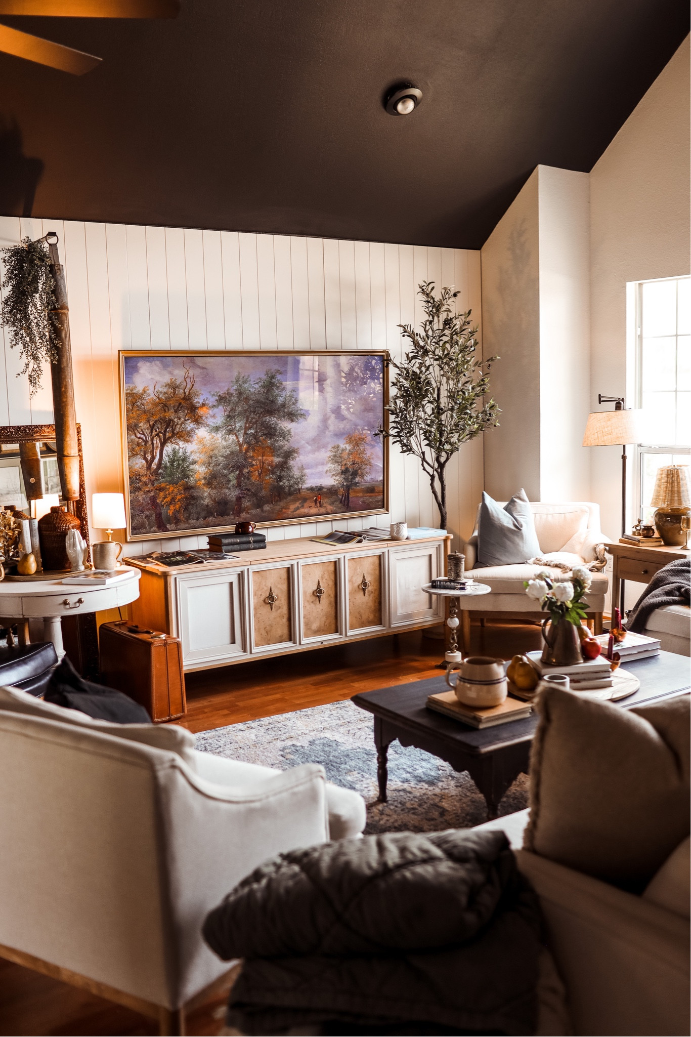 Our living room has been feeling so cozy lately! I prefer maximalism in a decorated space over minimalism and think it works really well in our home 💗 Especially, the faux tree and lighting for this space.

#LTKhome