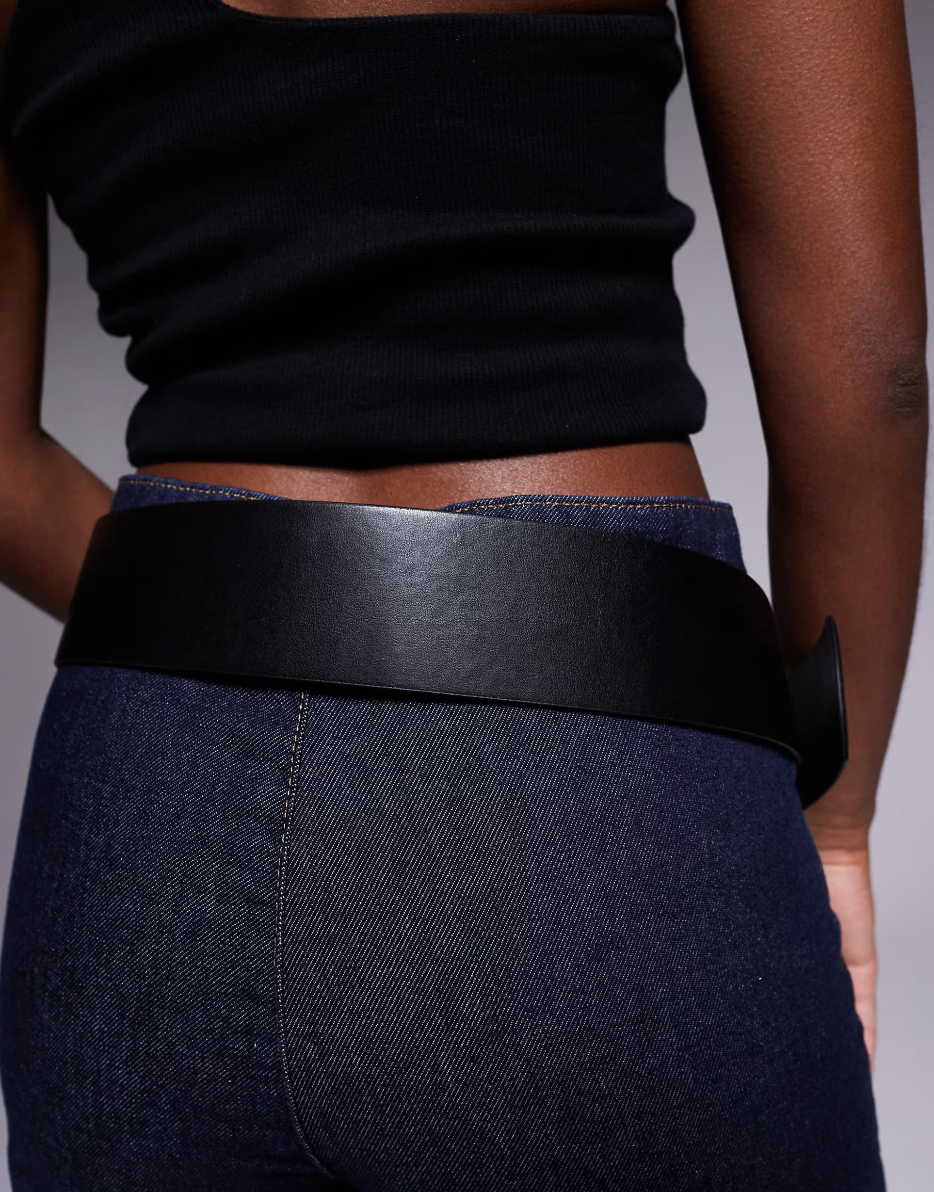 ASOS DESIGN wide low waist circle belt in black | ASOS (Global)