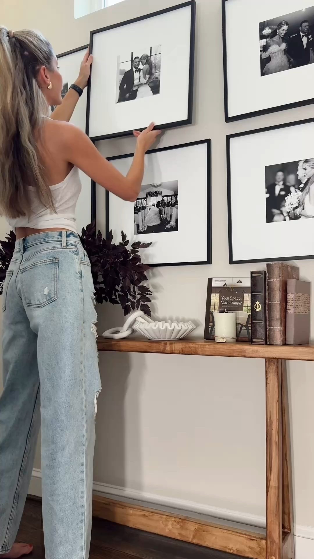 The exact brand of frames is called Mixtiles. Unfortunately their products arent linkable, but they are a made-to-order framing company and they have magnetic adhesive backing that can be moved all the house. One downside is that you can’t change the photo after you order them. 

They are DEFINITELY pricey (I had these on our wedding registry haha)… 

so i linked other frames that i own (and can account for!) below 🫶🏼  only difference is that one you have to DIY hang and the other you don’t. 

•
•

Empty wall styling ideas, black and white photo frames decor, magnetic photo frames, staircase wall,  pottery barn lookalikes dupes, skinny wood console table 

#LTKHome #LTKSeasonal