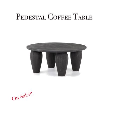 Pedestal Coffee Table currently on sale under $600! 

Transitional vintage amber Lewis black table round coffee table