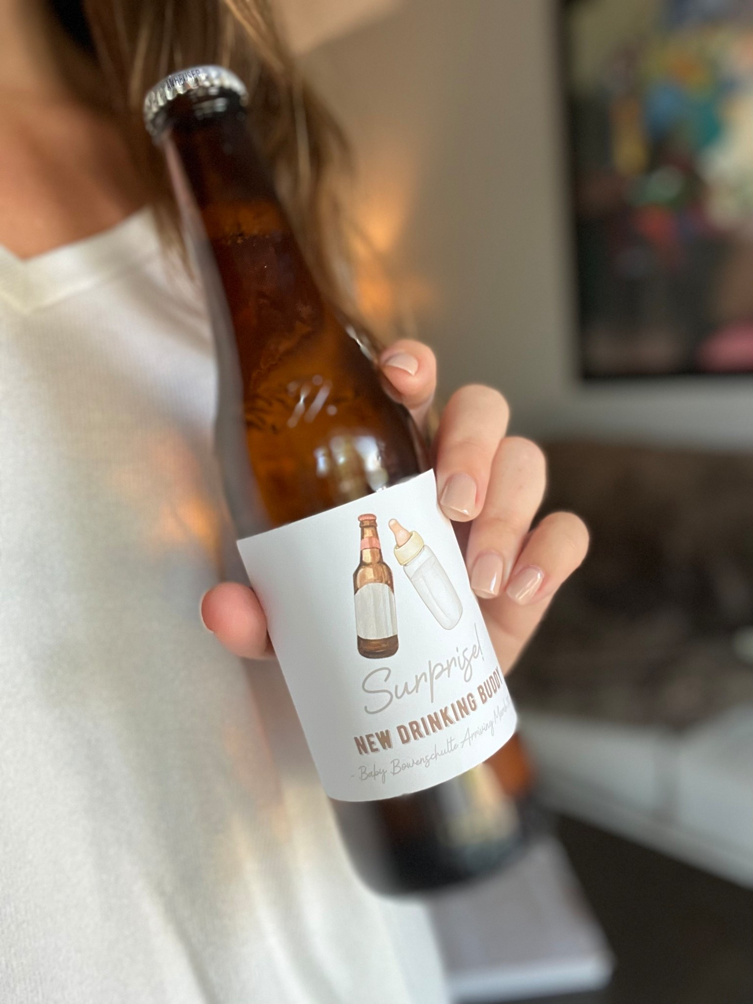 This is how we told my parents we were expecting! My in laws invited them to town for a fun weekend laying by the pool so we thought it was the perfect time to tell everyone together! I got these stickers off Etsy - I soaked the other labels off and popped these on when the bottles were dry! 

#LTKBaby #LTKFamily #LTKBump