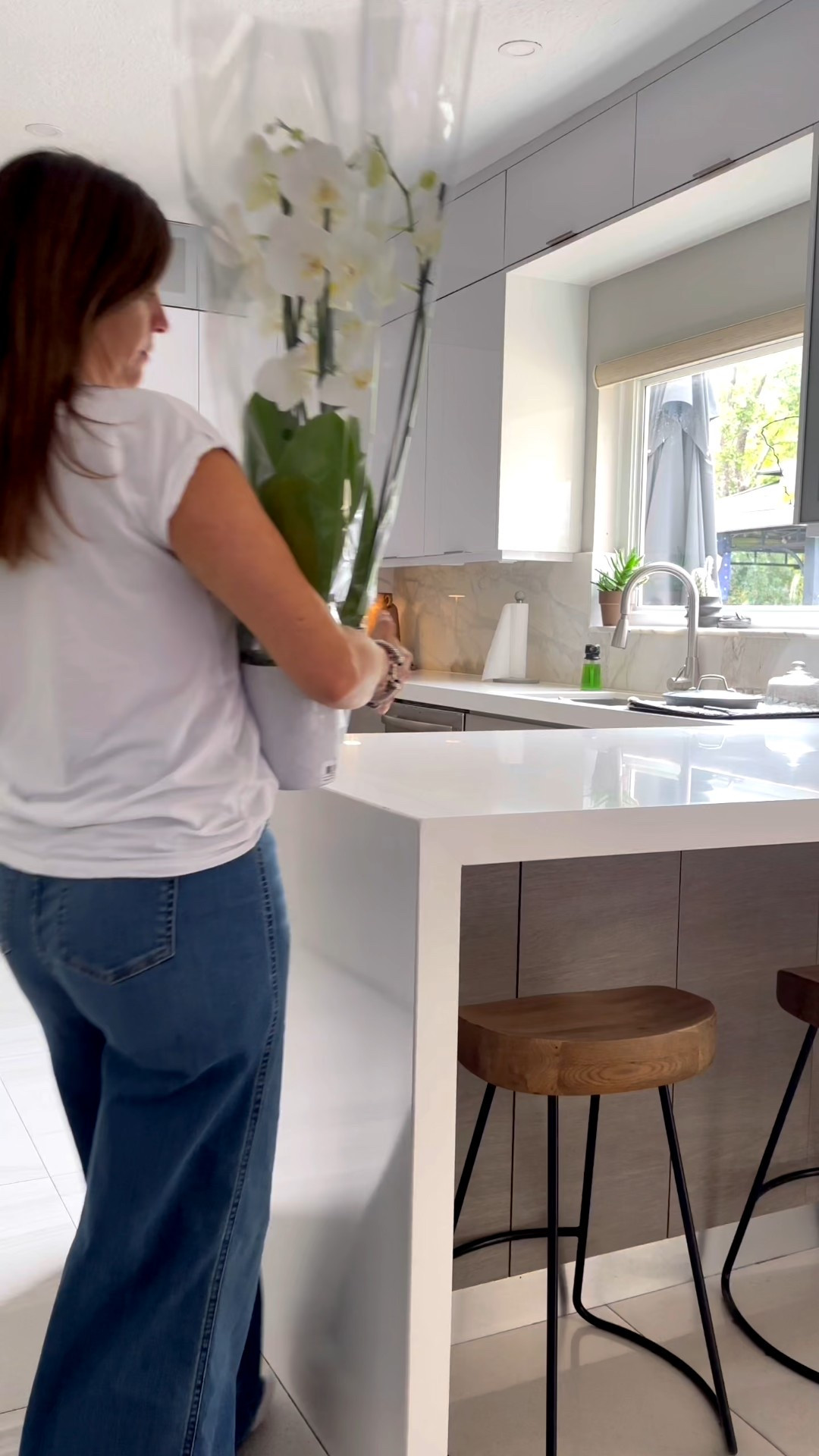 An easy orchid arrangement that makes any space feel fresh and put together.

#LTKdayinmylife #LTKHome #LTKstorytime