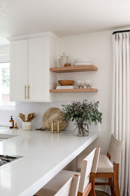 Shop our neutral kitchen decor! These floating shelves are so easy to install, and these counter stools are comfortable and affordable! 

#LTKhome #LTKSeasonal #LTKsalealert