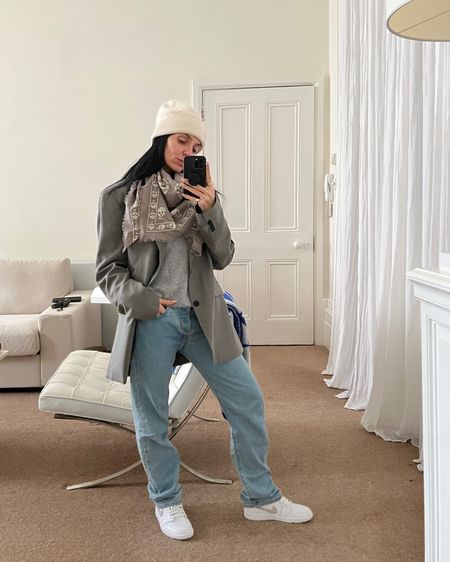 Donna Bartoli of donnabartoli.com wears a chic, daytime winter look. Original Levi 501 jeans, cashmere beanie, grey cashmere jumper, Nike Jordan low trainers, wool scarf. Some items listed are similar 

#LTKfit #LTKSeasonal #LTKeurope