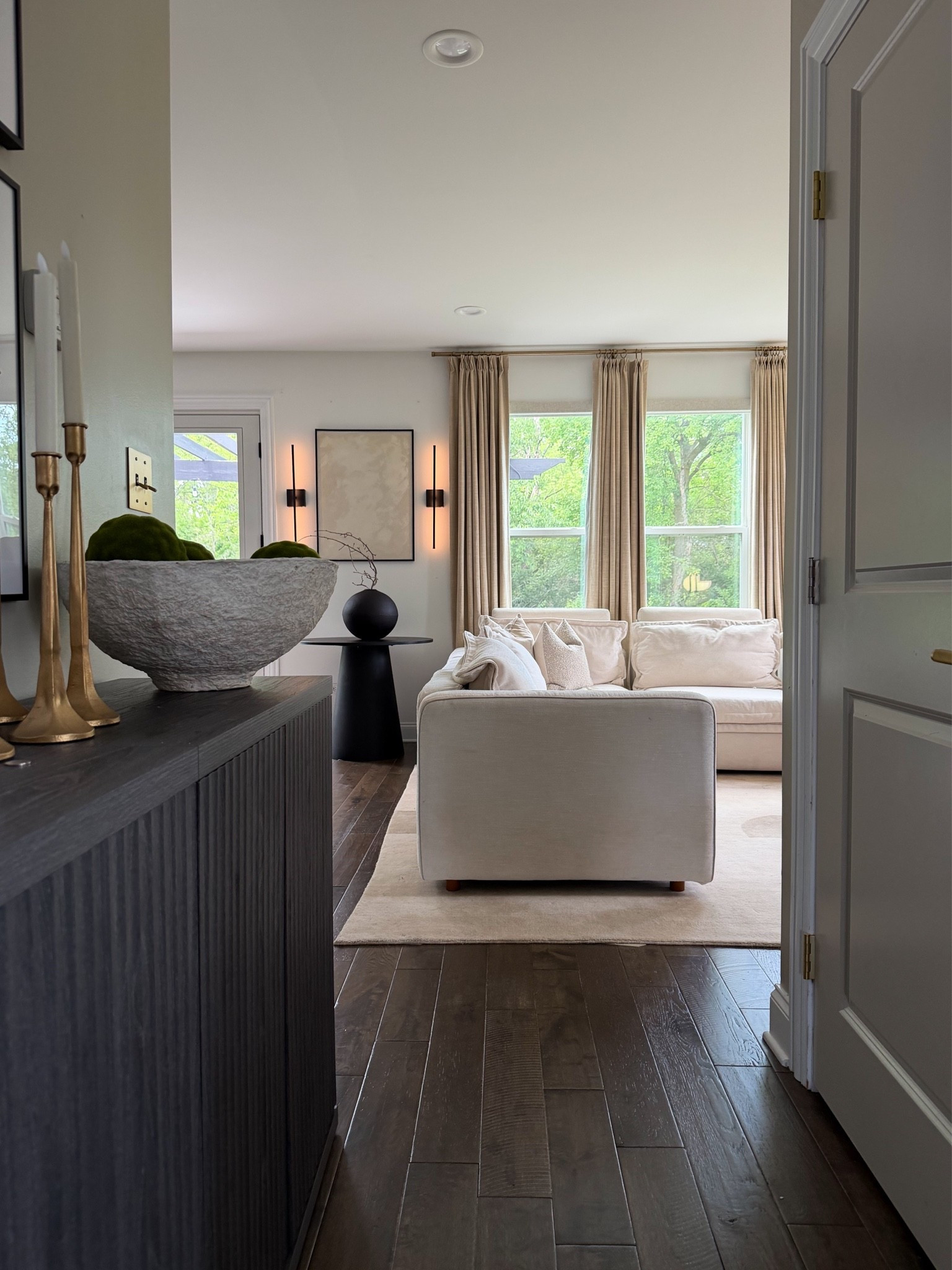 Warm wood tones, soft lighting, layered textures, and little details that make home feel calm, cozy, and elevated. Proof that you don't need an over-the-top space to create a luxury feel.

#LTKHome #LTKdayinmylife #LTKmomlife