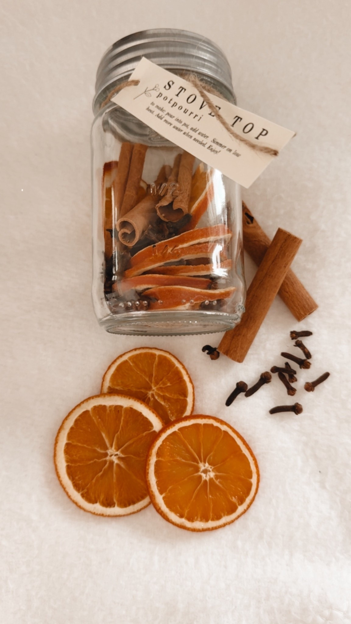 Homemade Christmas gift idea 

Simmer pot - stovetop potpourri 

So easy to make! And can make it so many different ways! 

All you need is a mason jar, dried orange slices, cinnamon sticks, & whole cloves! Can add rosemary as well if you want. 

#LTKFindsUnder50 #LTKGiftGuide #LTKHoliday