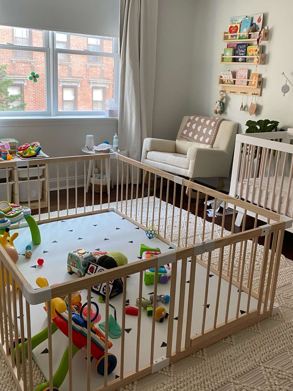Baby got a playpen. He already loves holding on and pulling himself up!

Wooden playpen. Nursery decor. Nursery run. Neutral nursery. Nursery bookshelves 

#LTKfamily #LTKbaby #LTKhome