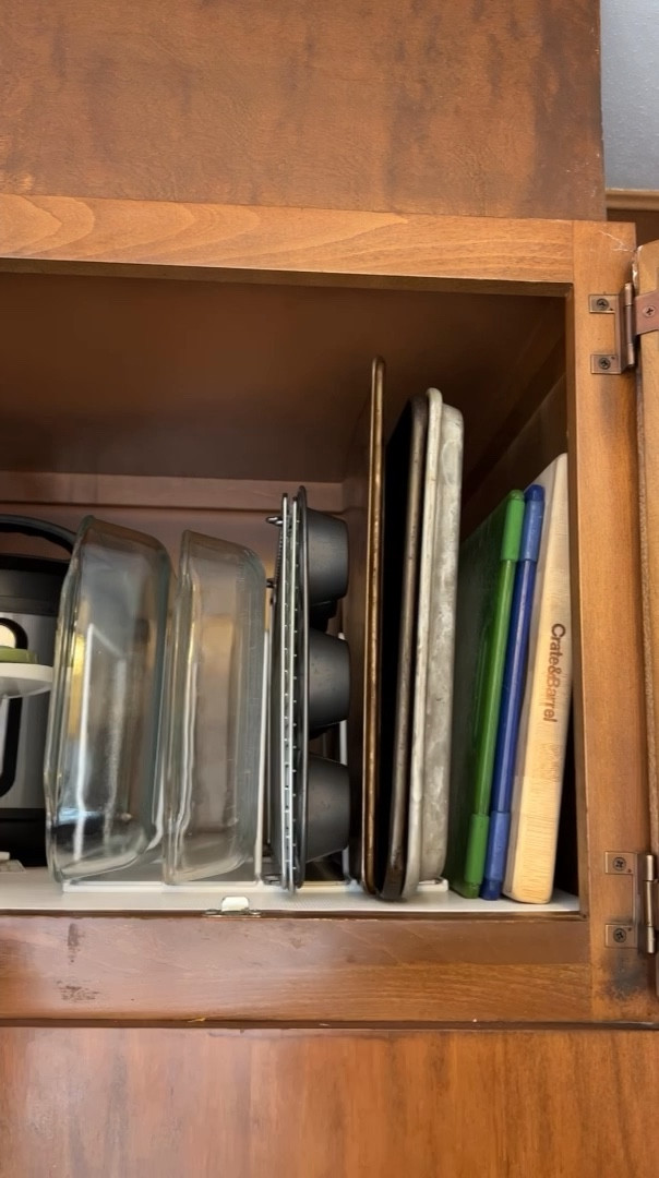 The easiest hack for storing baking pans is to use a rack and store the items vertically! I love how this organizer fits in small cabinets but still can still hold a lot!

#LTKhome #LTKFind