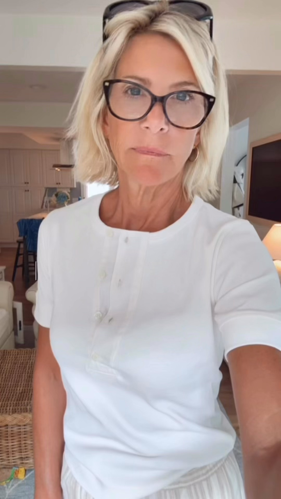 My all-white summer outfit with flowy wide-leg pants, a white top, metallic sandals, and a red tote made even a quick grocery run feel put together

#LTKdayinmylife #LTKgrwm #LTKootd