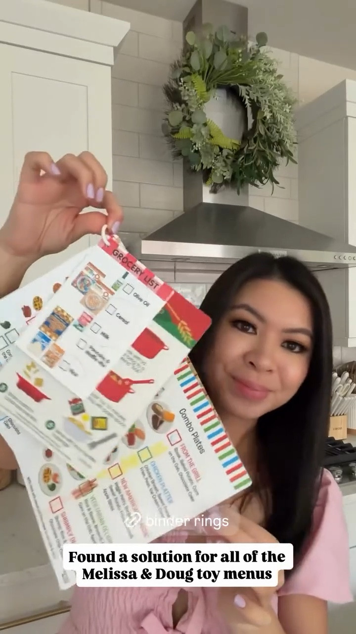 Binder rings and hole puncher! 
Found a solution for all of the Melissa & Doug toy menus