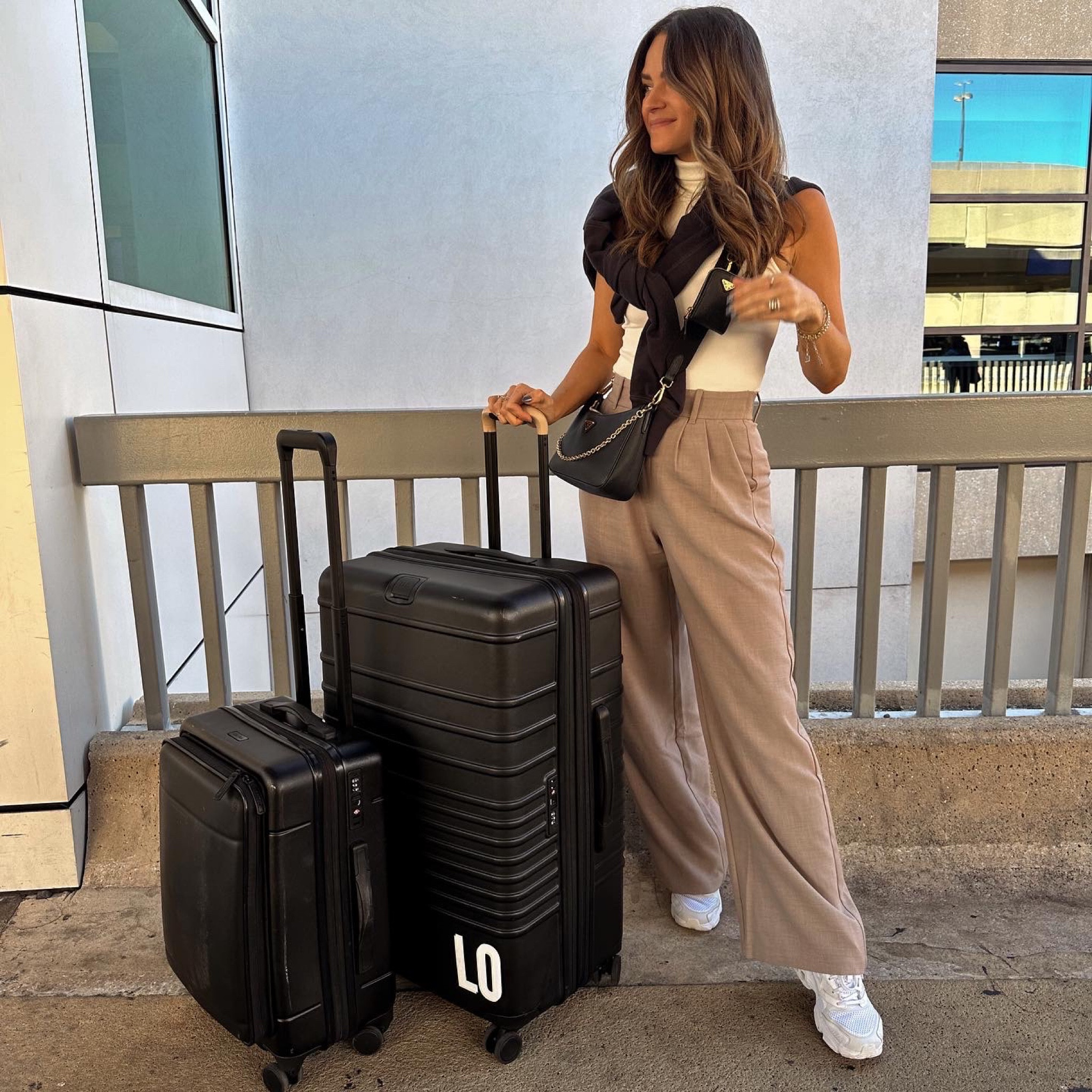 Cute + casual travel outfit. I own these pants in a few colors & love how easy it is to dress them up or down. Wearing a S in everything. Pants & bodysuit come in several colors & are great closet staples // travel outfit, travel style, fall outfit, winter outfit, winter style, neutral outfit
