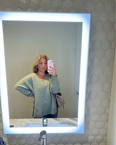 Pastel v-neck sweater for spring. Sold out in green but I love the blue!! Fits oversized. Wearing a size small! 

#LTKstyletip #LTKSeasonal #LTKunder50