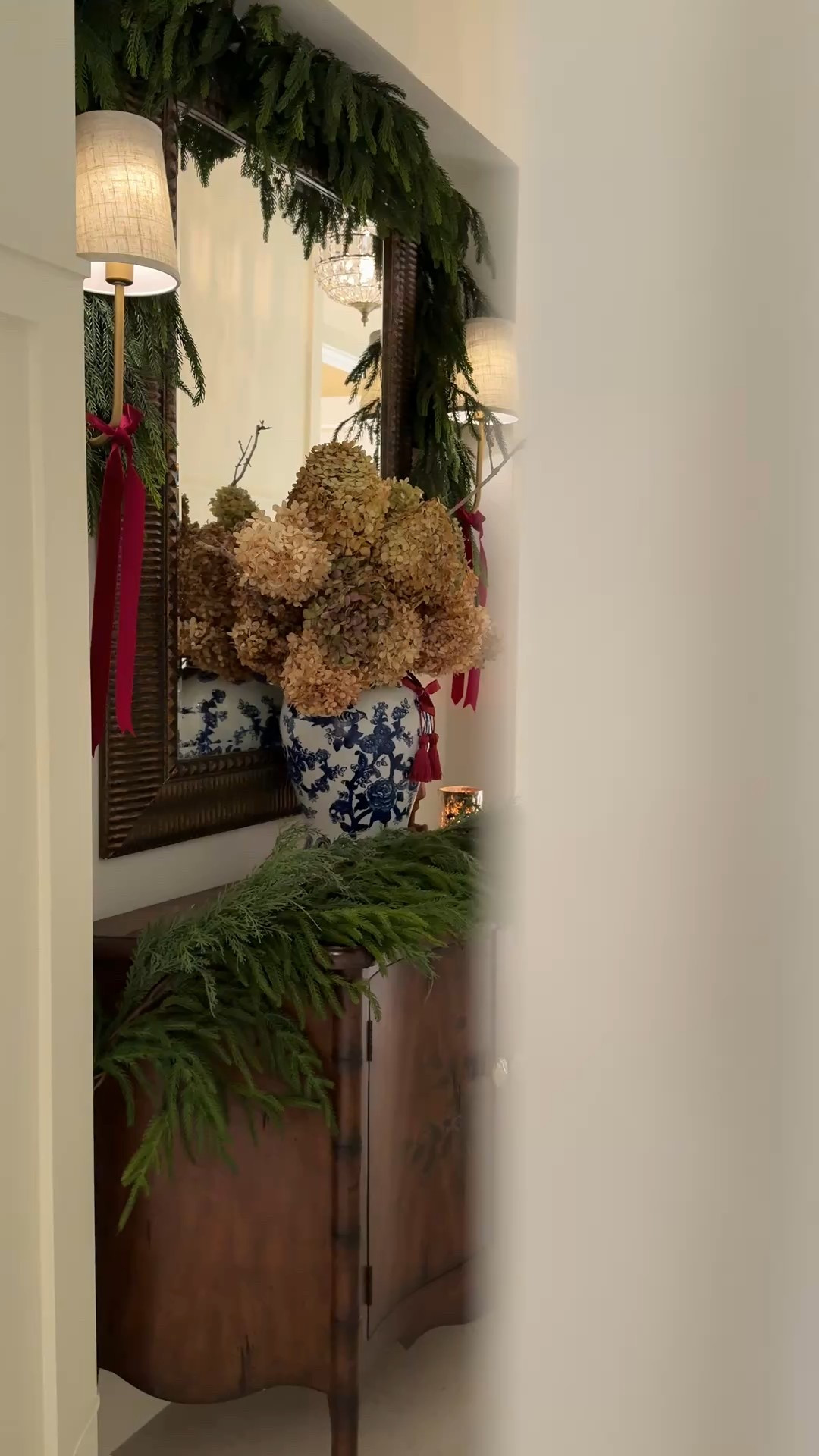 A sprinkle of Christmas in our hallway. This Norfolk pine mantel garland is perfect for draping over a mirror or cabinet.

Garland. Norfolk Pine. Christmas Garland. Holiday Decor. Classic Christmas. Wall Sconces. Pendant Lights. Hallway. Lavender Rose Home.

#LTKHoliday #LTKSeasonal #LTKHome