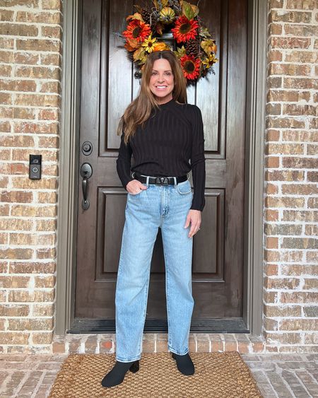 Loving this black form fitting mock turtleneck from the Cabi clothing Fall and Winter collection. Fits tts. I’m wearing a size small. Also linked are my jeans (which are high rise straight in size 26 petite), belt, and boots. On sale now! Love this outfit for a casual edgy look. #cyberweeksale #winteroutfit #layeringsweater

#LTKCyberWeek #LTKsalealert #LTKstyletip