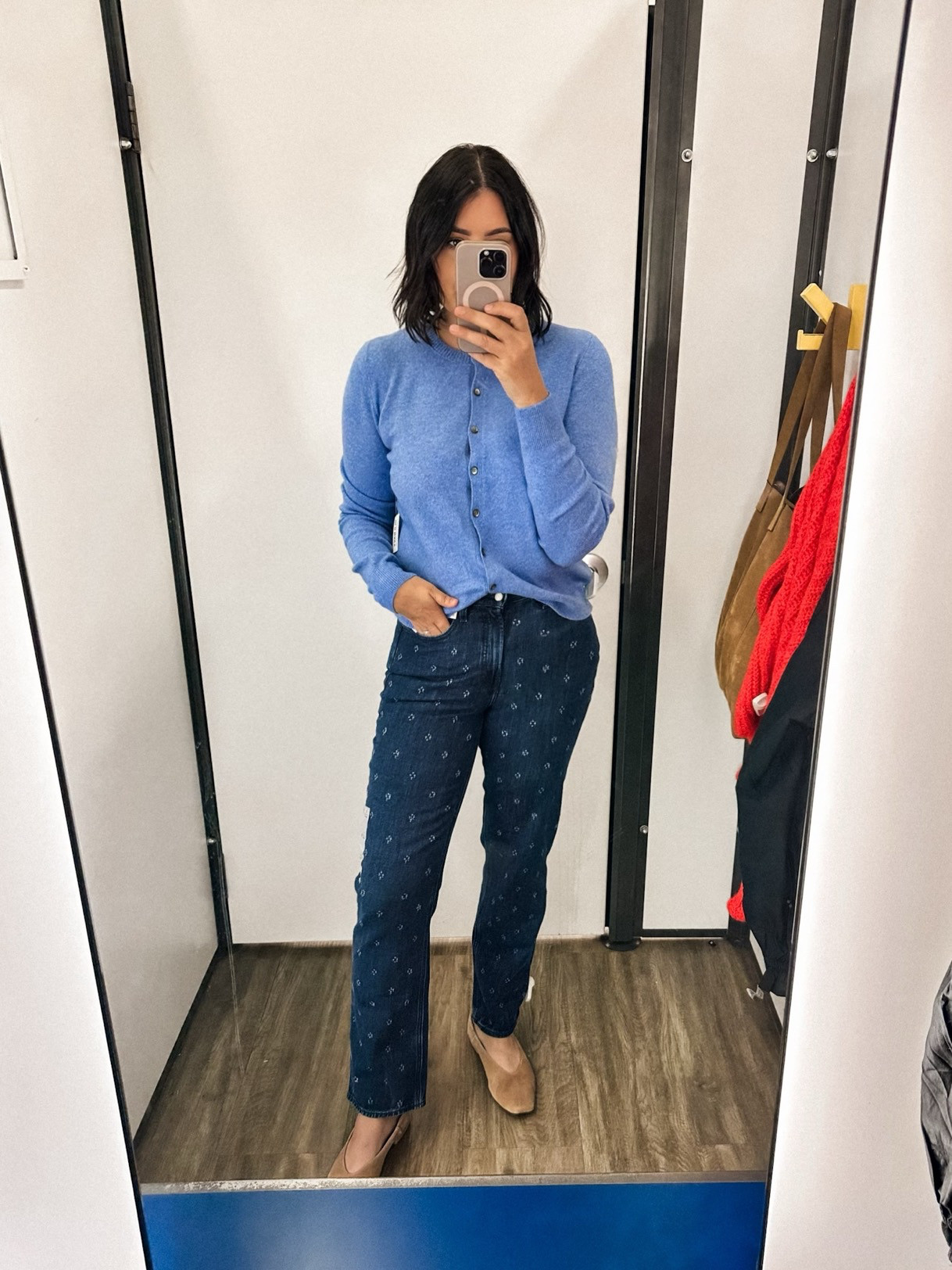 I am in the medium of the cardigan, it runs relaxed! So so so soft. Comes in a lot of colors too!

I am in the 8 of the jeans, they run snug at the waist!  

 