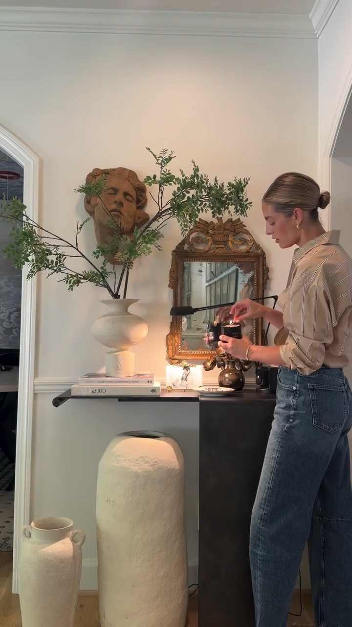always collecting🖤 old, new, sentimental (like my grandmother’s picture frame) & a few weird little treasures. I love when a space feels collected over time instead of perfectly “decorated”.

my foolproof console styling formula 👉🏼 book stack + something green + lamp + family photo + candle

I linked everything I could and found some really cool alternatives for the antique & one-of-a-kind pieces I’ve collected over the years.

#LTKHome #LTKootd #LTKdayinmylife