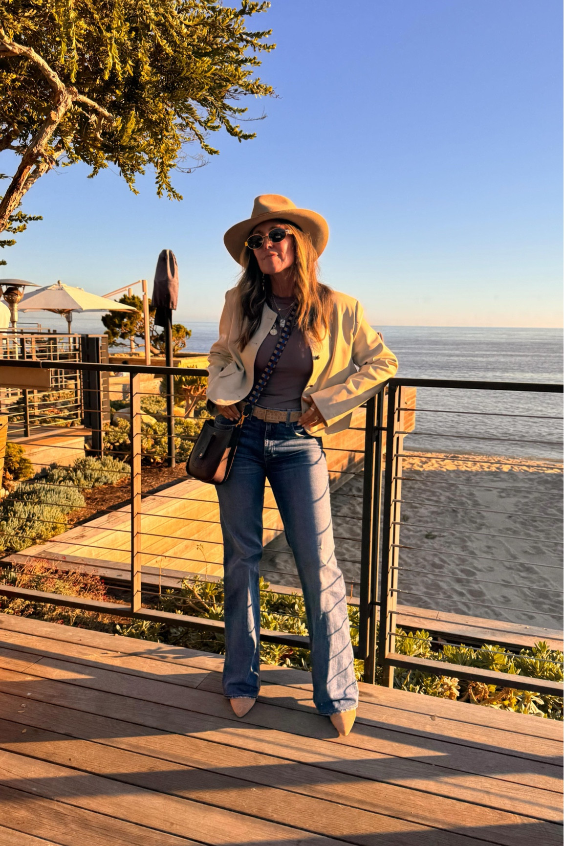 West Coast girl edition #ootd Comment LINK and I’ll DM you this entire look! I never got so many compliments on a hat before. ❤️🧑‍🌾 All pieces are my go-to basics like a triple lined fitted top in chocolate brown, my favorite boot cut jeans, this cream faux leather jacket with gold button details, classic cowboy boots, gold rimmed sunnies, and a Hermes Evelyn bag to complete the look!

#theglowup #theglowgirl #ootd #westcoastgirl #oceanviews #holisticliving #hatoftheday #mystylediary #over50style