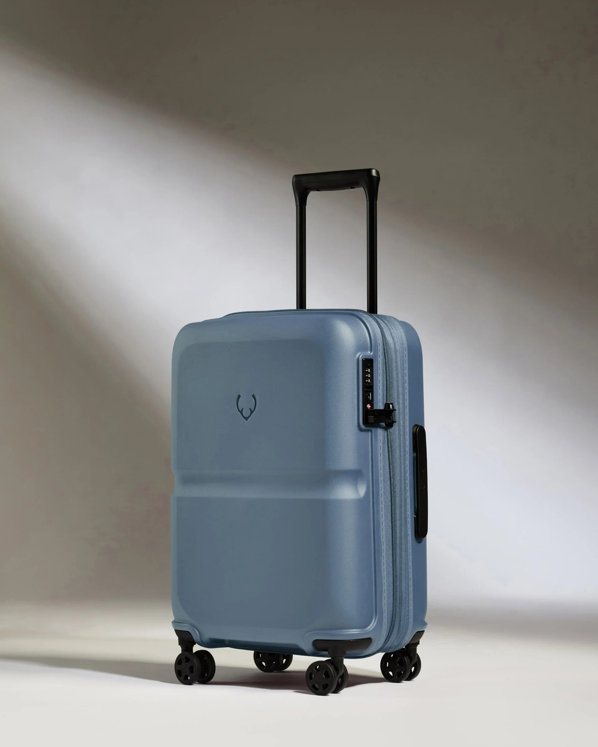 Expandable Carry-on Suitcase in Light Blue - Single Stripe | Carry-on Bag Luggage | Antler USA