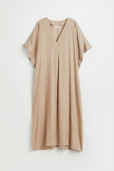 Calf-length dress in woven viscose fabric. V-neck with a pleat at front for volume and soft drapi... | H&M (US + CA)