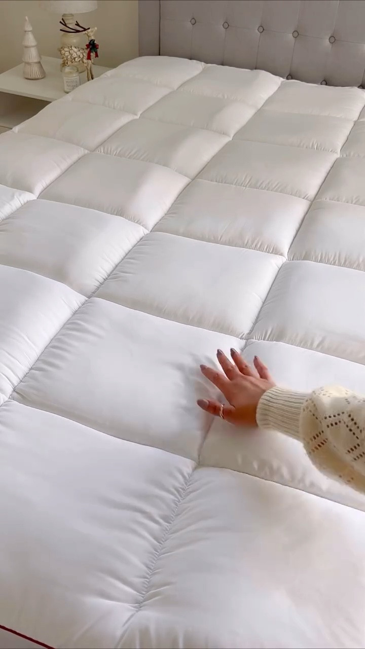 ☁️☁️☁️We bought this topper for our guest bedroom  about a year ago and almost immediately bought one for ours too! If you want your bed to feel like the most luxurious hotel, get this! It’s cooling and seriously feels like your sleeping on a cloud. It protects your mattress too && machine washable!

#LTKWatchNow #LTKHome #LTKFindsUnder100
