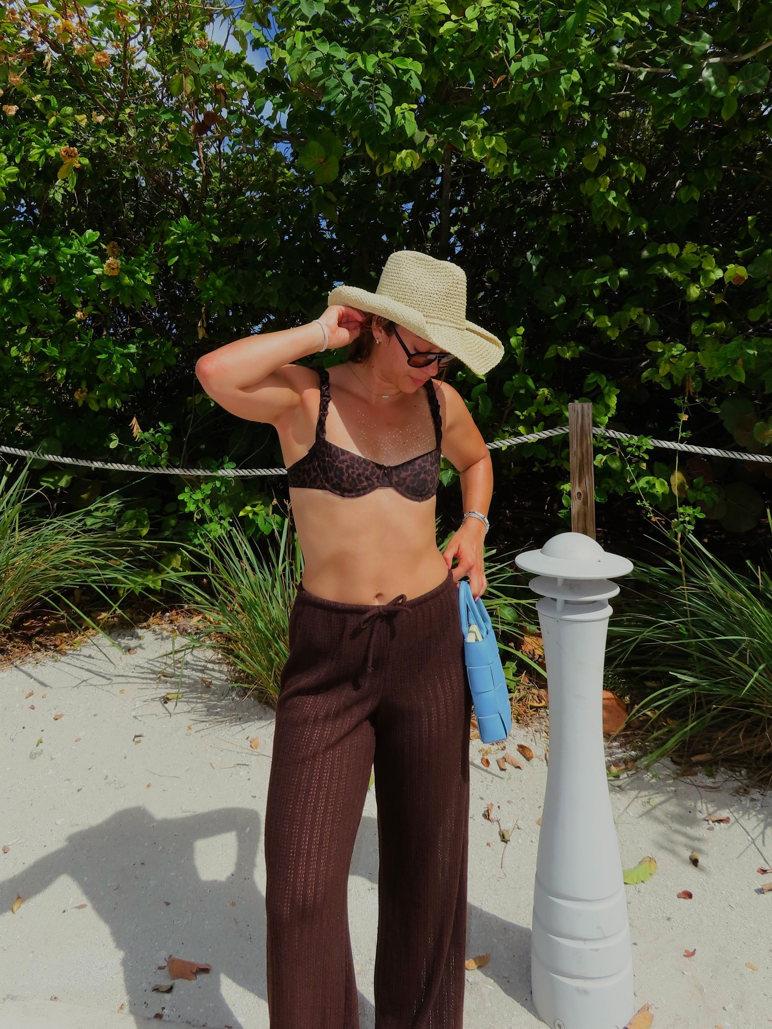 It’s starting to feel like summer in Miami! Sharing my beach day essentials from these perfect crochet beach pants, my cheetah print bikini and straw hat 

#LTKTravel #LTKSpringSale #LTKSwim